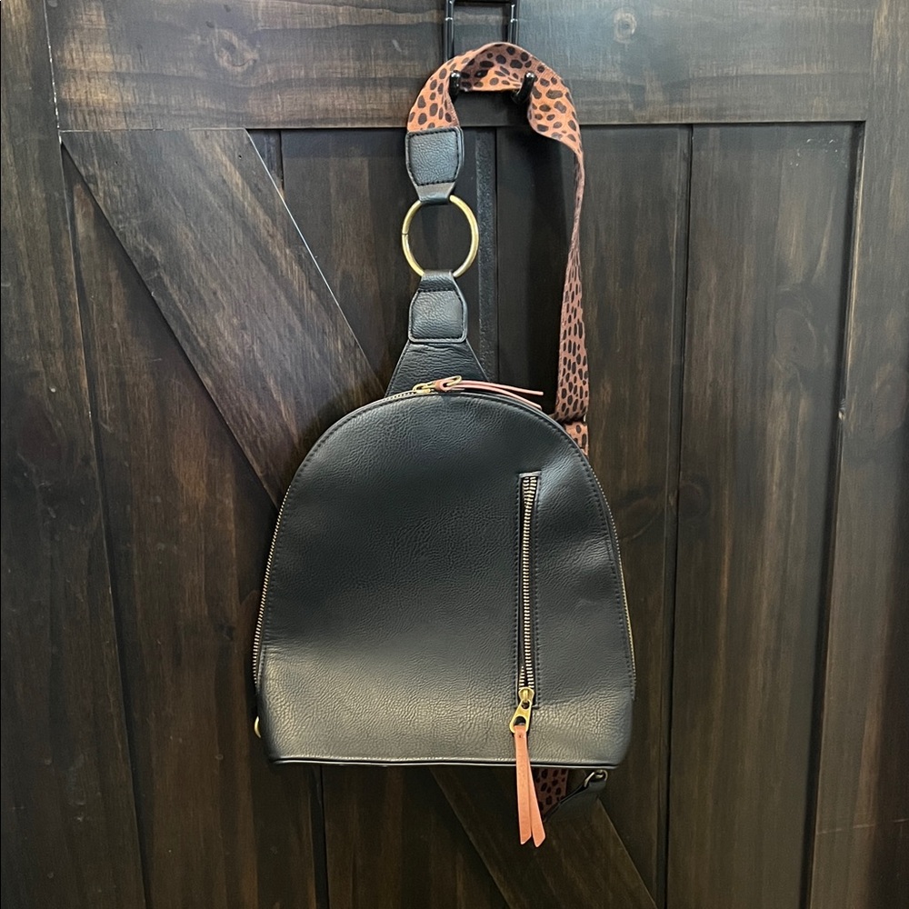 Black Leather Backpack with Leopard Print Strap
